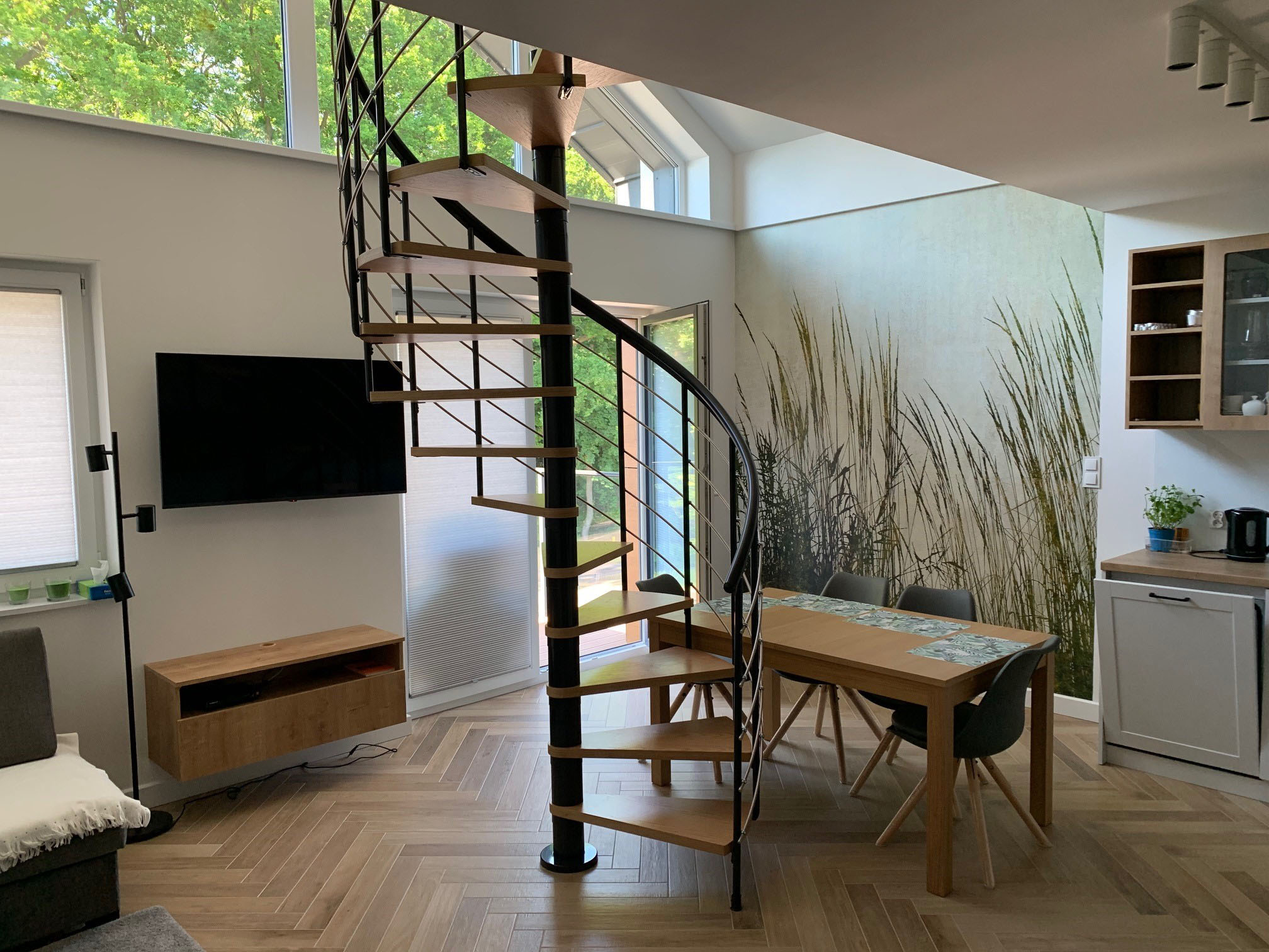 Classic Montreal spiral staircase leading to the Airbnb apartment